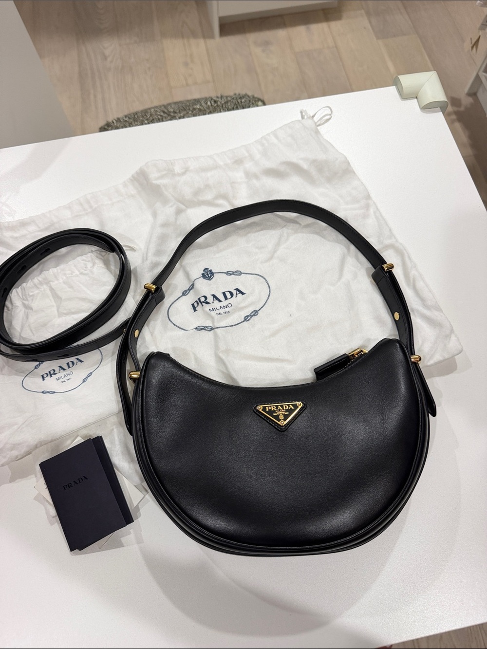 Prada Arqué mini leather shoulder bag